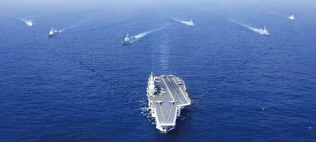 中國航母南海動態(tài)更新與小巷美食探秘